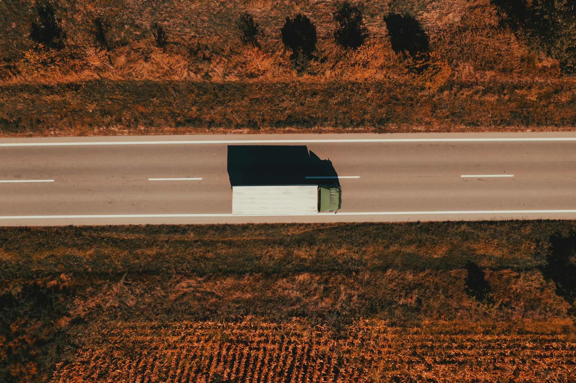 Semi-truck on the road from above